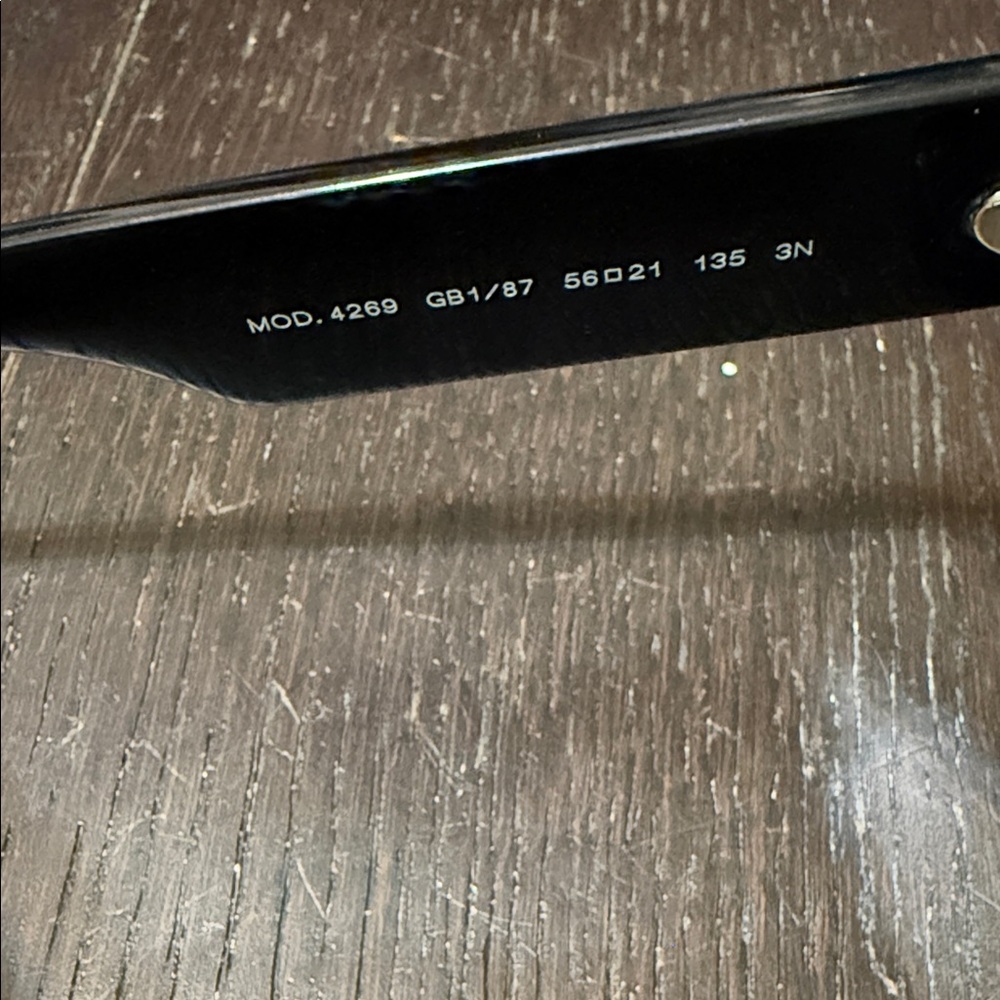 Versace Black Cat-Eye Sunglasses with Gold Stud Accents - Picture 4 of 6